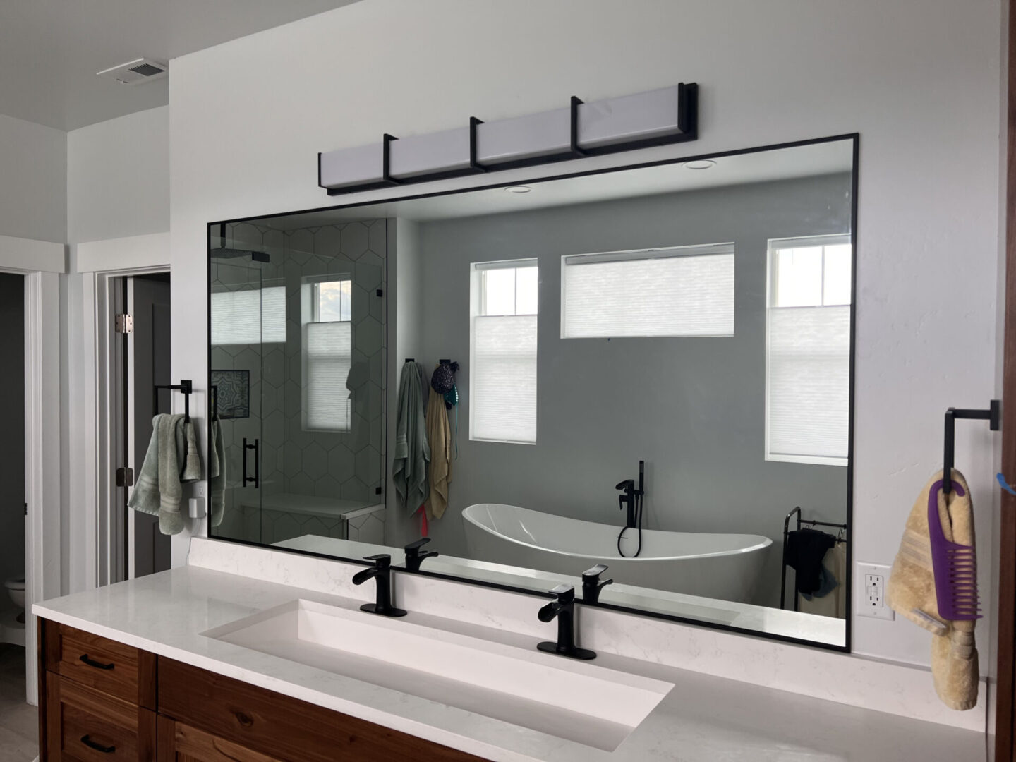 large black framed mirror double sink