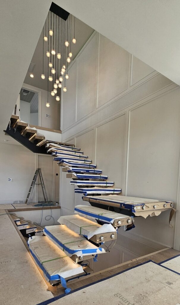 Staircase railing - before w chandalier - Jeske Glass Staircase railing - before w chandalier