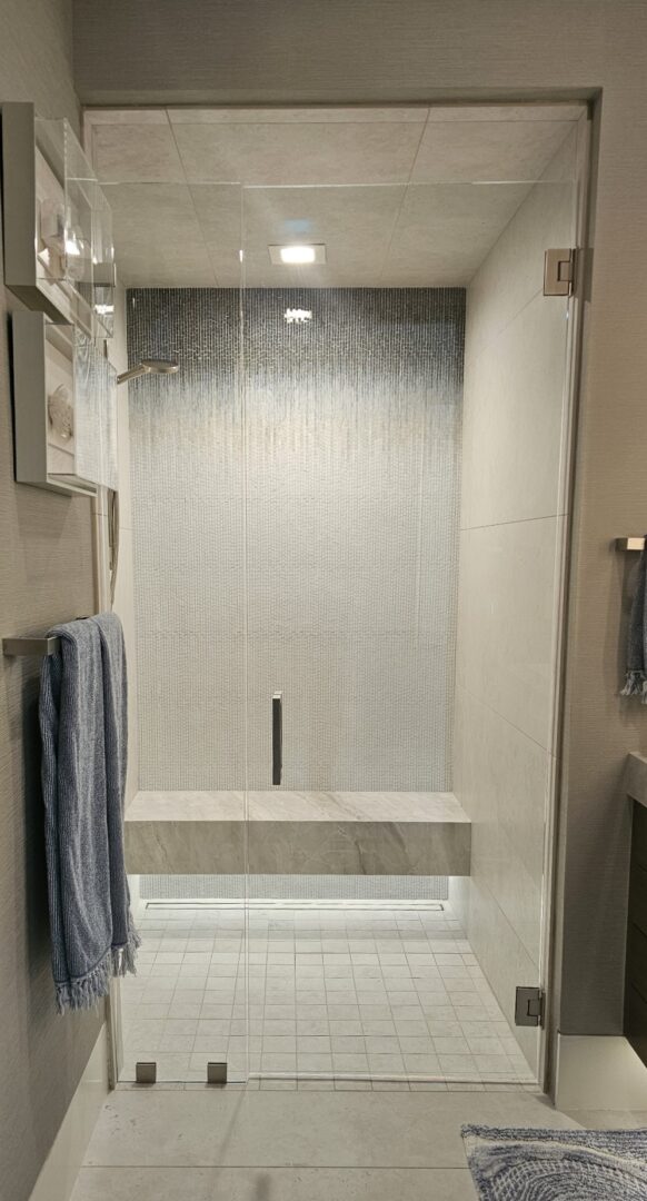 glass shower door w gradient tiles