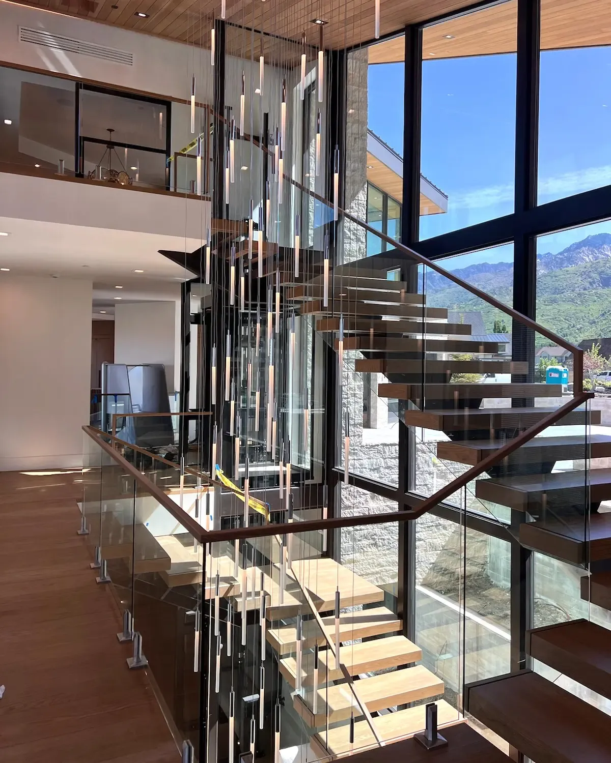 imgi_7_staircase-railing-chandelier-color-corrected.jpg